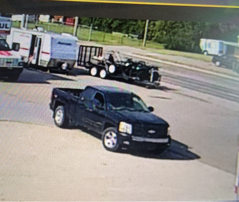 <b>This photo from surveillance video is believed to be of the pickup connected to the theft of a trailer and its contents. The trailer can be seen in the background.</b> Photos courtesy Salina Police Department
