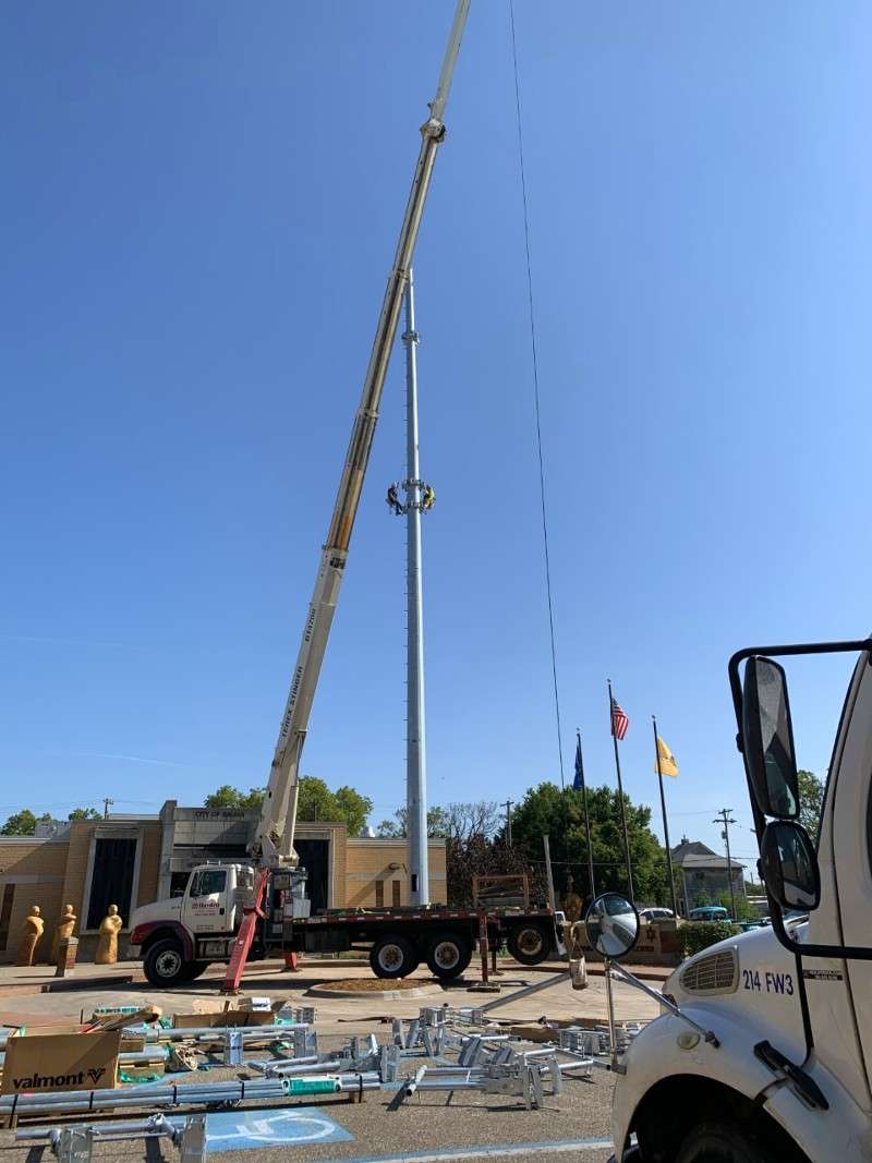 <b>Two people were working on the upper part of the tower Thursday morning.</b> Salina Post photos