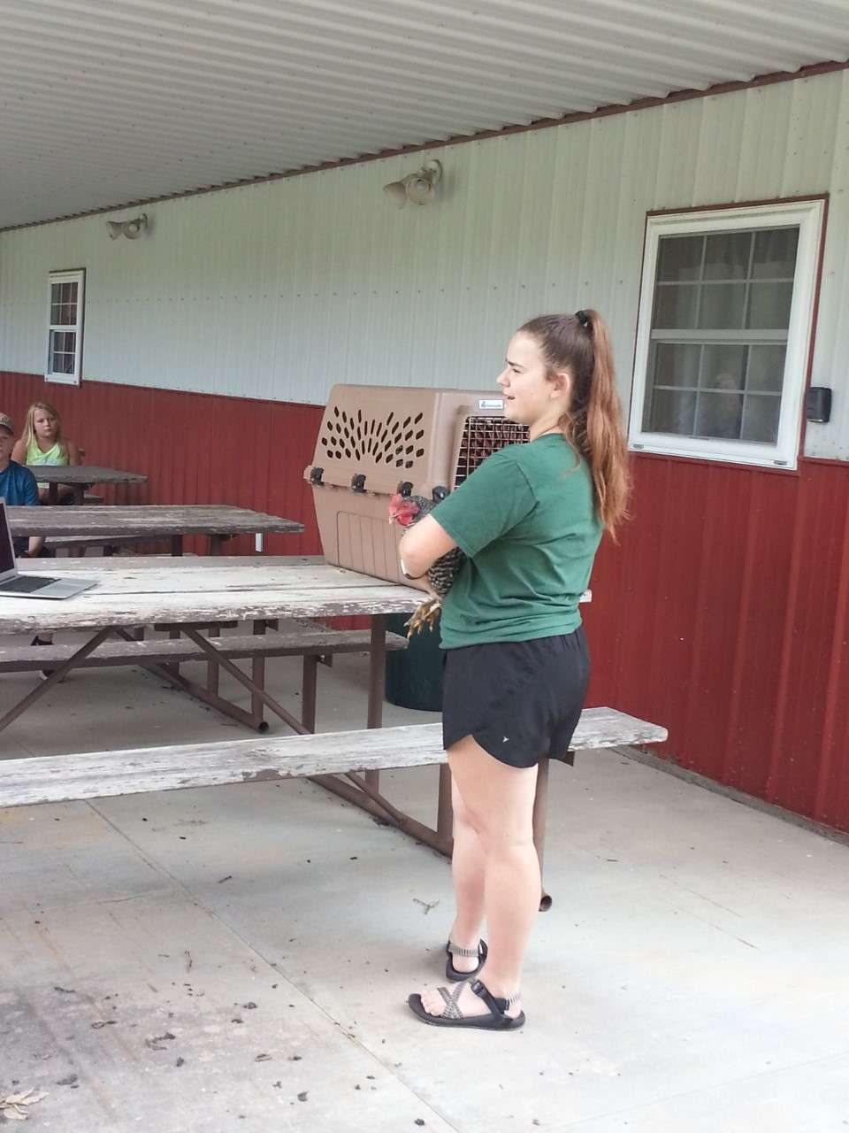 <b>Emma Littich shows one of her chickens at the Smoky View 4-H Club tour on July 18. </b>Photos courtesy Smoky View 4-H Club