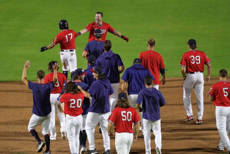 <b>Teammates celebrate the Wichita Wind Surge walk-off win.</b> Photo courtesy Wichita Wind Surge