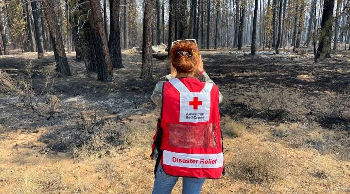 <b>Near Bly, Ore., Christina Tsutsui Tharp, Red Cross Disaster Action volunteer looks for dwellings affected by wildfire.</b> Photo by Dan Halyburton courtesy American Red Cross