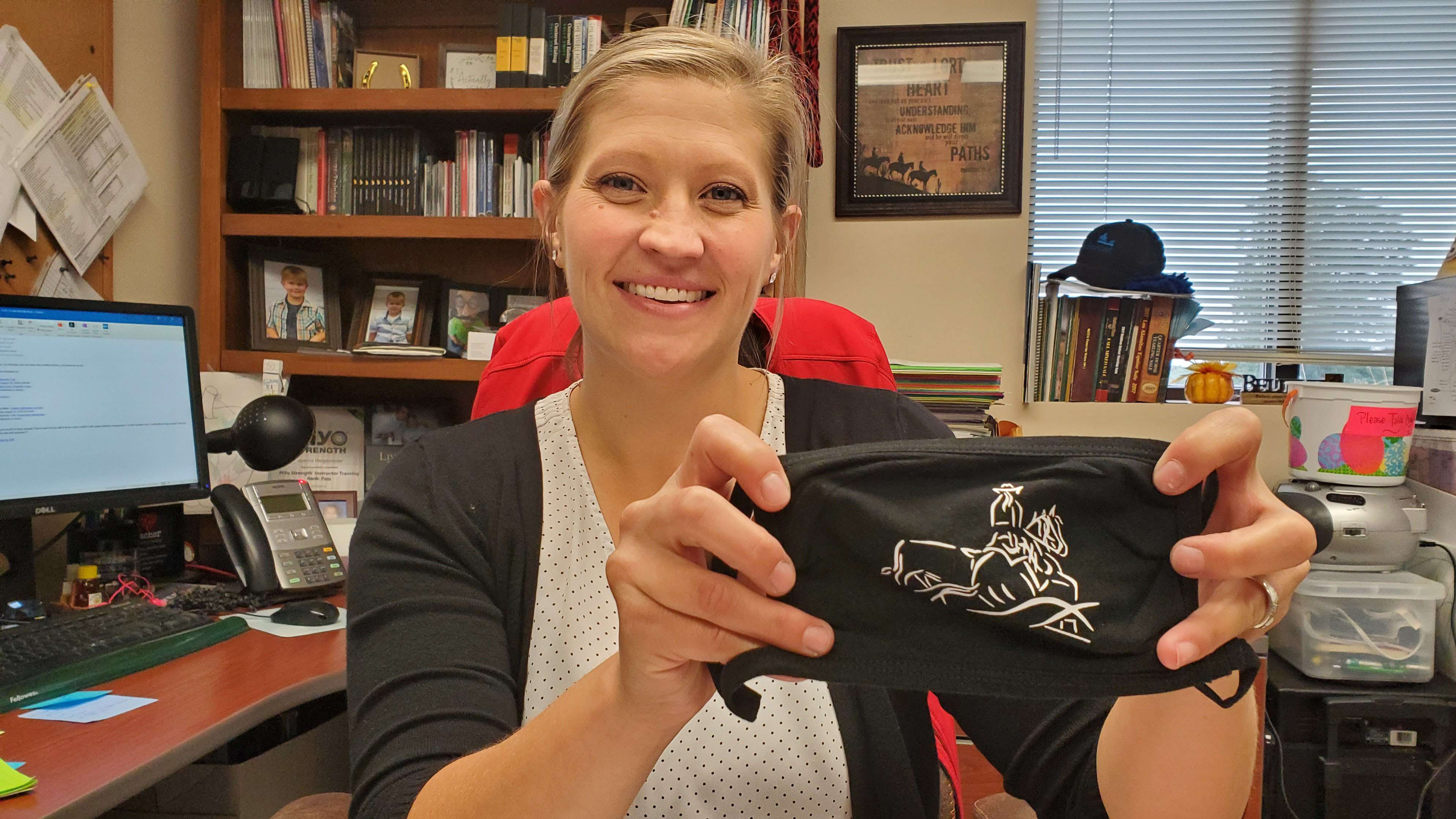 <br>Animal Science Professor and Ranch Horse Team Coach Jo Hergenreder displays her mask of horse and rider. She keeps it handy for use in the office and classroom. (Crawford / NCTA News)&nbsp;&nbsp;
