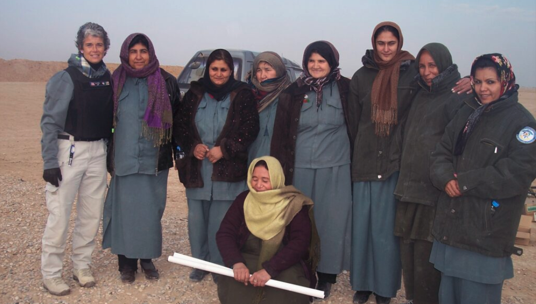 Lori Reeves (left) poses with a group of Afghan women she trained for their work in correctional facilities in 2009. (Submitted)