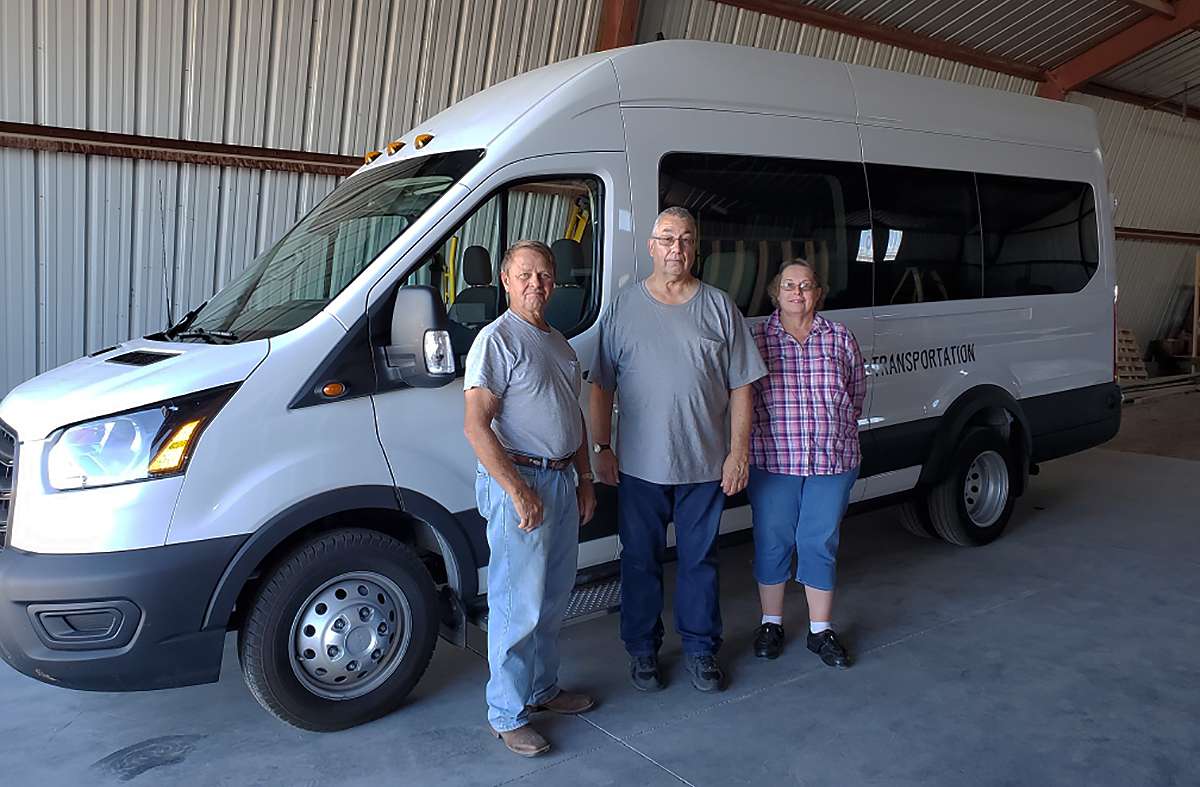 WaKeeney recently bought a van with grant funds to begin out-of-town public transportation. From left: Terry Rush, Ed Schmeidler, Michelle Rauch (three of the van drivers). Jacque Hobbs is the other fully trained driver, not pictured.