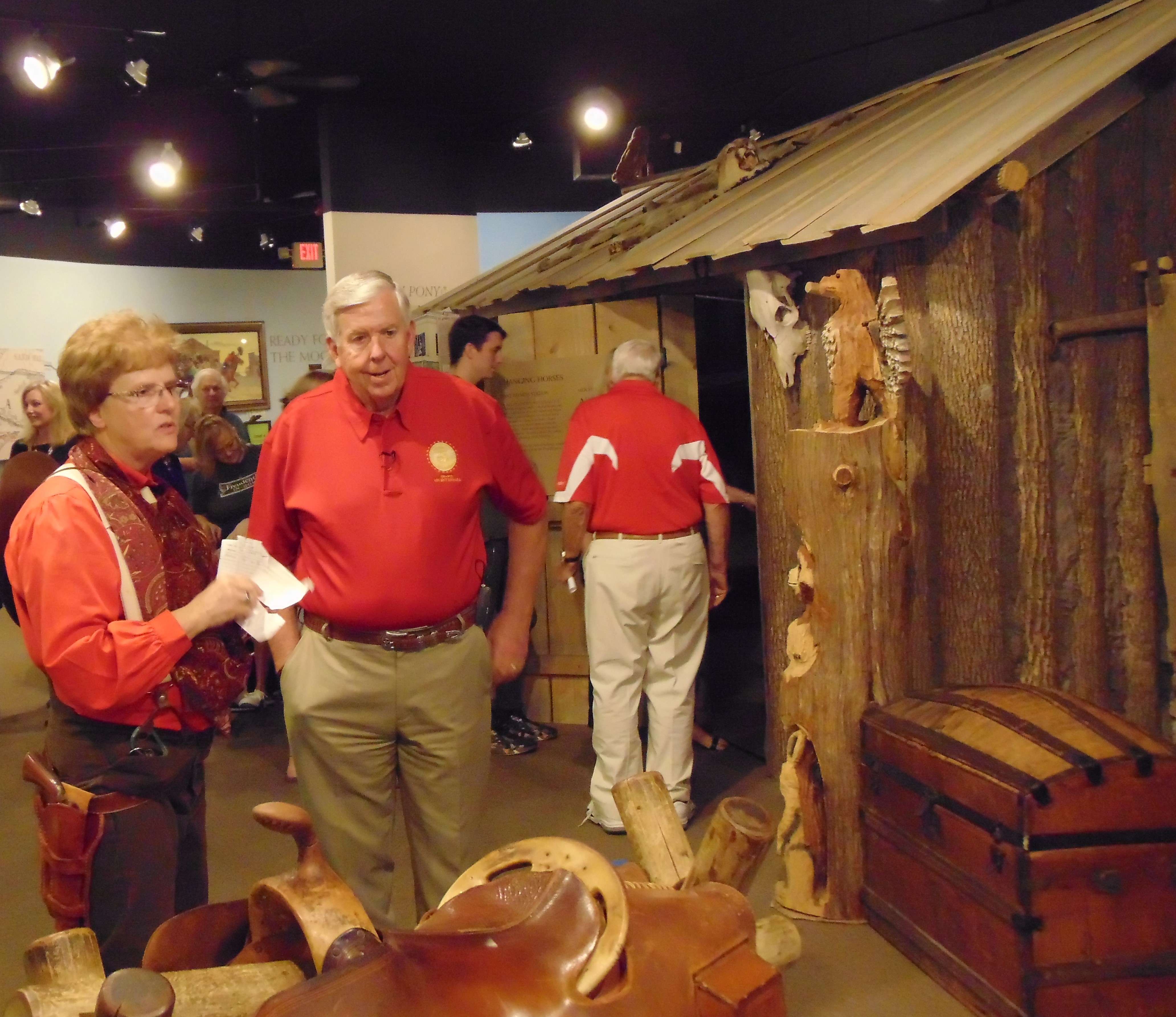 Missouri Gov. Mike Parson listens as Museum Ex. Dir. Cindy Daffron gives him a tour of the Pony Express Museum during a recent visit/File photo