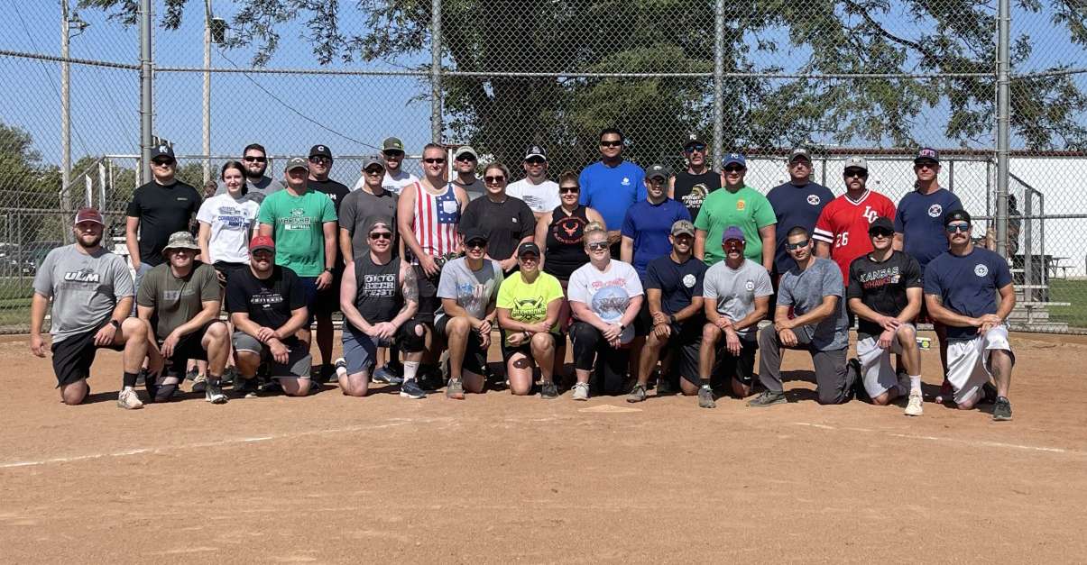 Members of all three teams that played in the fundraiser — the Hays Police and Fire departments and Ellis County EMS. Courtesy photo