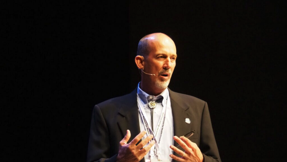 Sen. Mark Steffen, a Republican, said he was working to force a special legislative session to consider bills blocking mask and vaccine mandates for COVID-19 and to open up use of off-label medications during the pandemic. He spoke Monday at the Freedom Revival in the Heartland at City Center Church in Lenexa. (Tim Carpenter/Kansas Reflector)