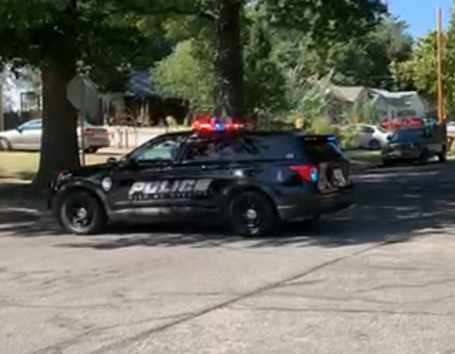 Police near the Wichita State campus during Thursday's fatal shooting investigation-photo Wichita Police