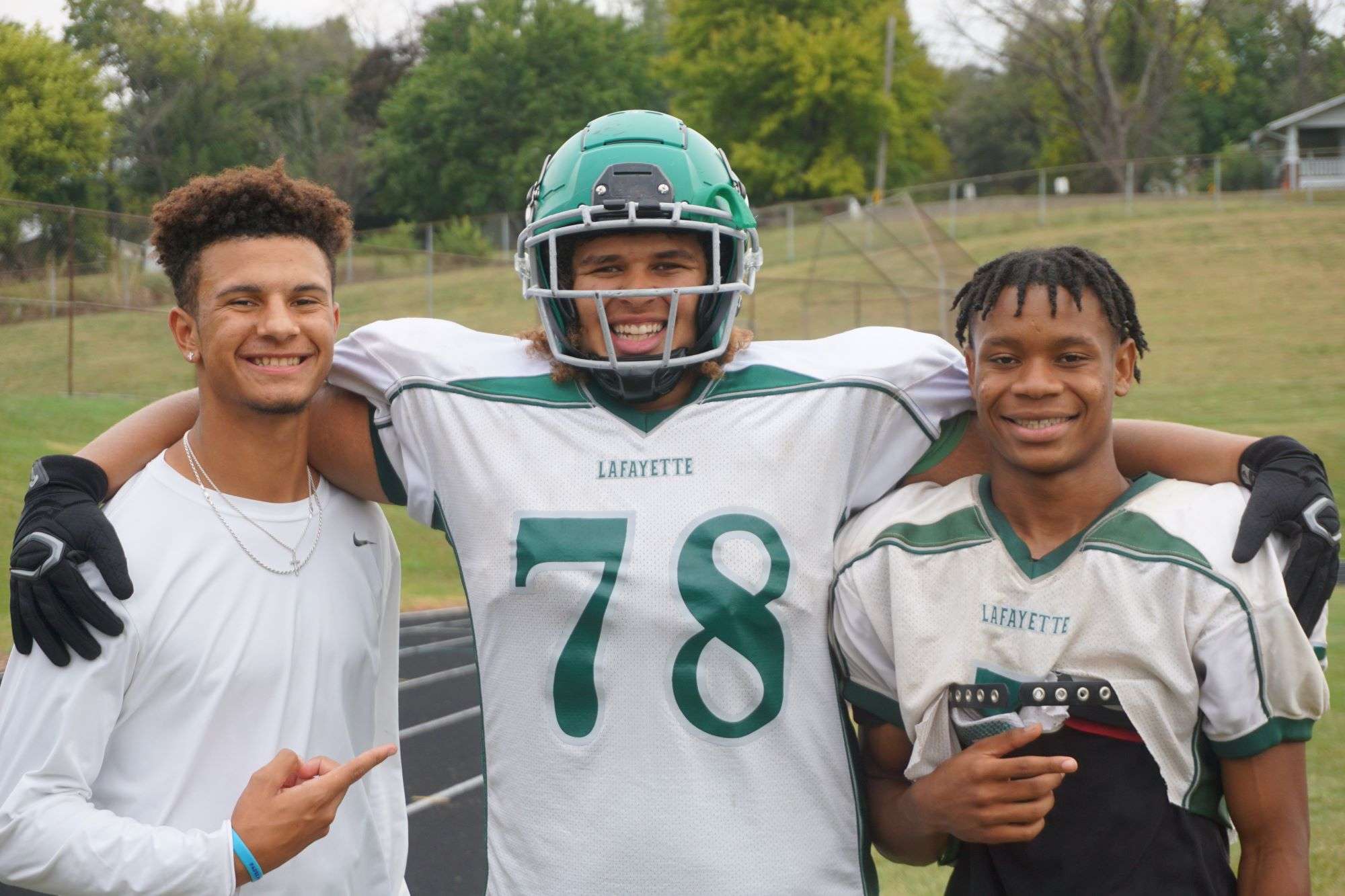 Lafayette's Jaron Saunders (left), left tackle Quentin Garrett (center) and Kingston Oliver (right). Photo by Tommy Rezac.