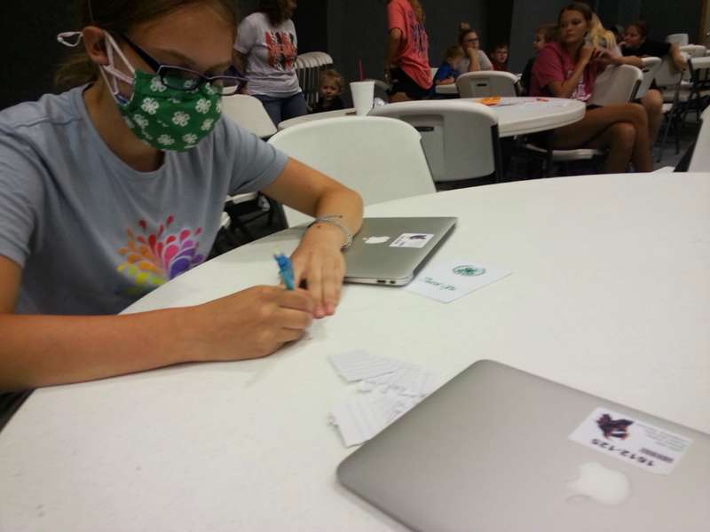 <b>Acacia Pracht, member of the Smoky View 4-H Club, votes for club officers for the coming 4-H year. </b>Photo courtesy Smoky View 4-H Club