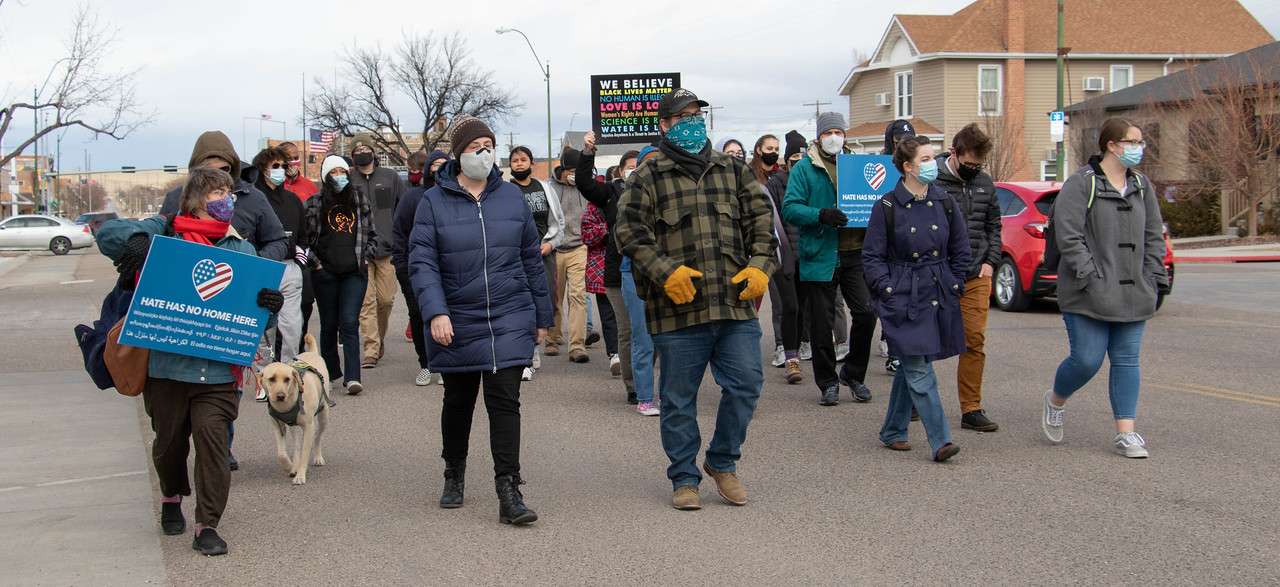Chadron State College employees, students, and community members march south on Main Street Jan. 18, 2021, as part of MLK Day activities. (Tena L. Cook/Chadron State College)