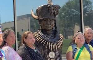A bust of Chief Standing Bear was unveiled earlier this year in front of a state office building, across the street from the State Capitol, that was renamed for the famed Ponca chief. (Paul Hammel/Nebraska Examiner)