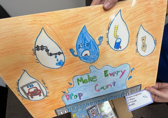 In this winning entry from the Hays art contest, a 2nd grade student depicted WaterSmart Wally anguishing at the sight of water being wasted. David Condos / Kansas News Service