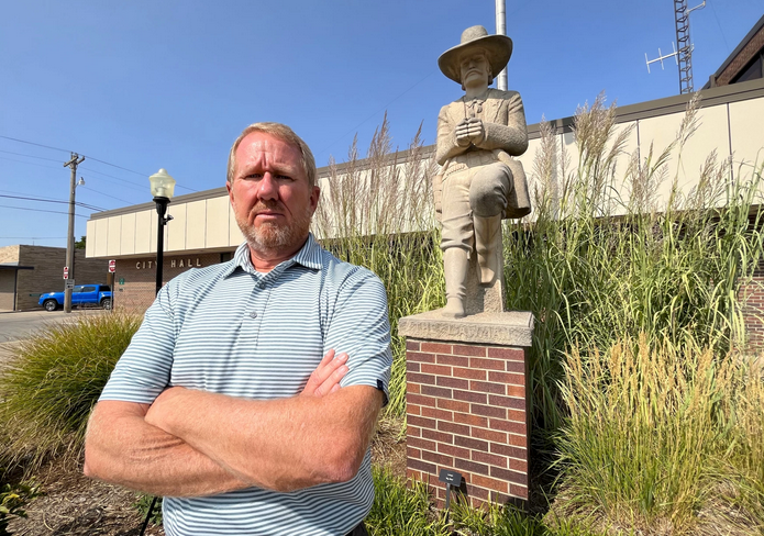 City manager, Toby Dougherty, stands in the middle of a drought-tolerant demonstration garden in front of Hays City Hall. The city has planted gardens like this throughout town to show residents which plants can work in this environment. David Condos / Kansas News Service