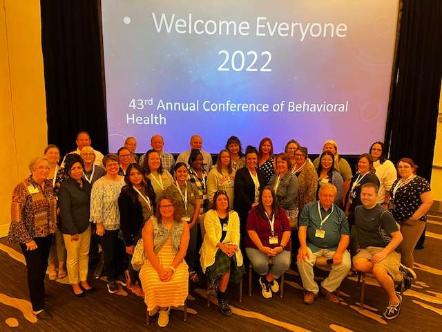 Staff members at The Center for Counseling &amp; Consultation, 5815 Broadway, attend a recent conference hosted by the Association of Community Mental Health Centers of Kansas.