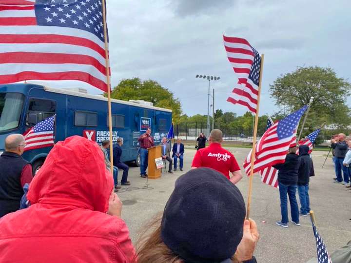 <b>Republican gubernatorial candidate Derek Schmidt speaks to those assembled in the Tony's Pizza Events Center parking lot Friday. </b>Photo courtesy&nbsp; Kansas GOP
