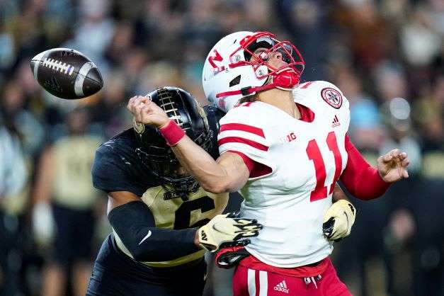 Purdue linebacker Jalen Graham (6) hits Nebraska quarterback Casey Thompson (11) to force a fumble during the first half of an NCAA college football game in West Lafayette, Ind., Saturday, Oct. 15, 2022. Nebraska recovered the ball (AP Photo/Michael Conroy)