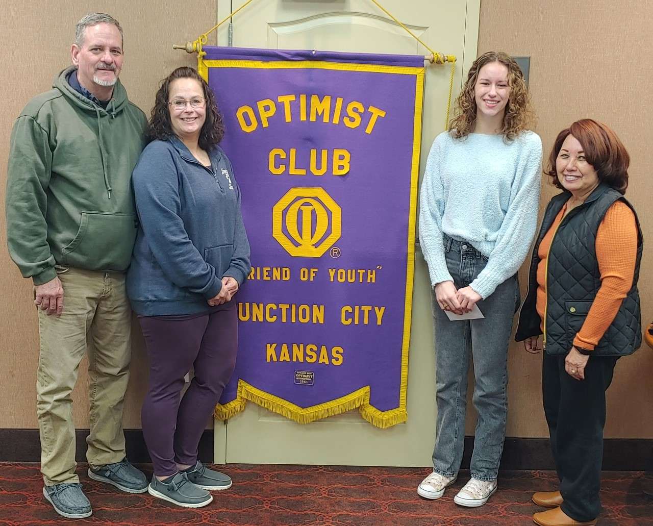 Pictured from left to right are Mark and Resia Muto, Macie’s parents; Macie Muto and Nita Miller, President of the JC Breakfast Optimist Club.