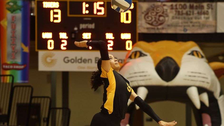 FHSU's Jaida Felix serves vs. Missouri Western Friday night at Gross Memorial Coliseum. (FHSU Athletics photo/Madison Shapland)