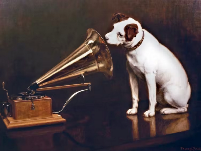  English artist Francis Barraud (1856-1924) painted his brother’s dog Nipper listening to the horn of an early phonograph in 1898. Victor Talking Machine Co. began using the symbol in its trademark, His Master’s Voice, in 1900. Wikipedia 