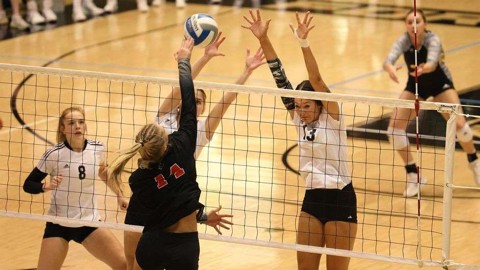 FHSU attempts a block vs. Central Missouri Saturday at Gross Memorial Coliseum. (FHSU Athletics photo/Madison Shapland)
