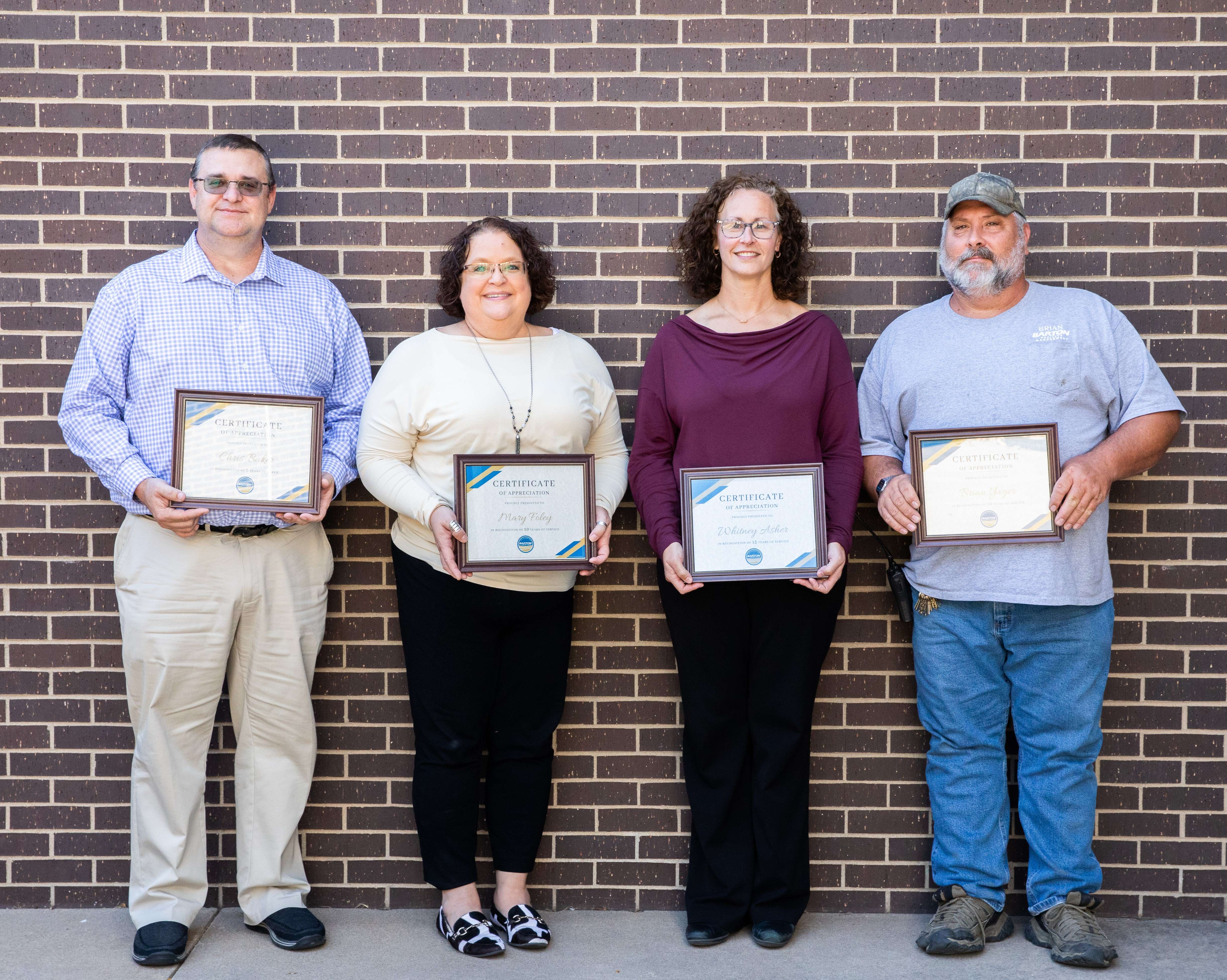 (From left to right) Chris Baker, Mary Foley, Whitney Asher and Brian Yager.