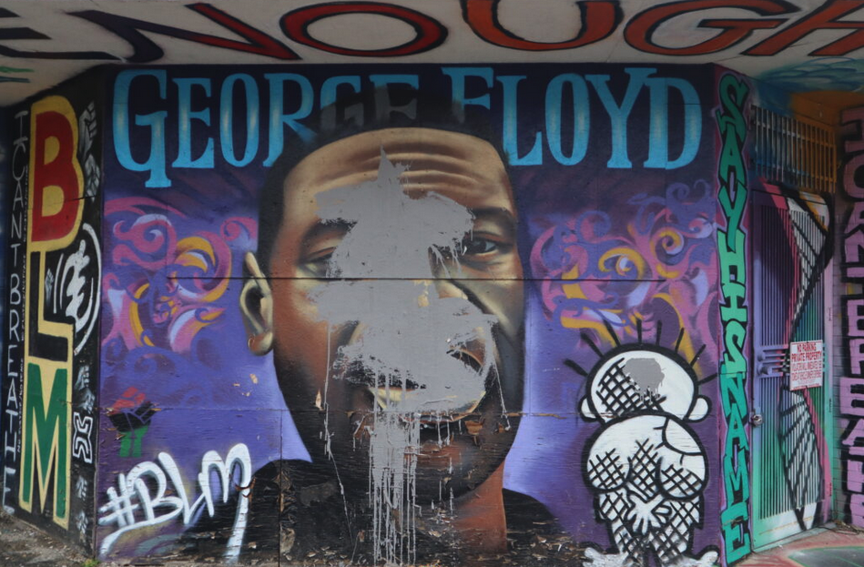 The George Floyd mural in Milwaukee, vandalized by an unknown person. (Photo | Isiah Holmes)