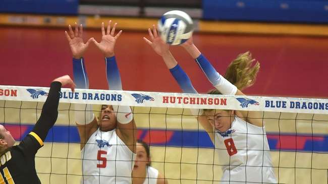 Baylee Miller (5), Anna Dean (8) and the Blue Dragon volleyball team drop a Jayhawk West match on Friday at Butler. File photo<br>