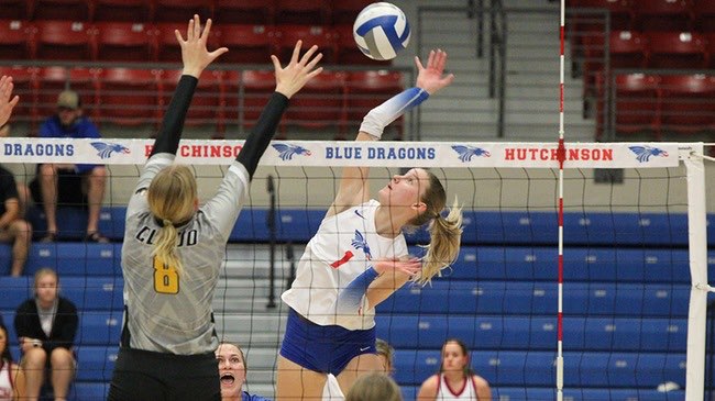 Perline Fery swings for one of her career-high 12 kills in the Blue Dragon Volleyball team's 3-0 Region VI Tournament opening-round victory over Cloud County on Wednesday at the Sports Arena. (Billy Watson/Sports Information)