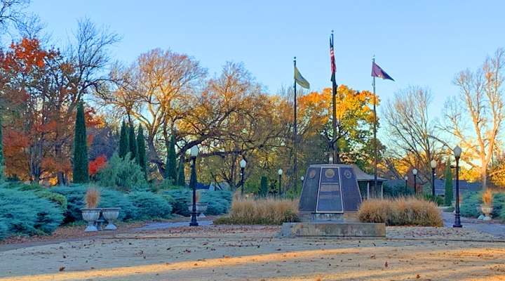 Salina-Saline County War Memorial, located in Sunset Park,  is an eight-sided concrete monolith with giant bronze plaques. Paving bricks with inscribed veterans' names outline the walkways known as the “Walk of Honor." The memorial was dedicated to the City of Salina in 1994 to be maintained by the Salina Parks and Recreation.