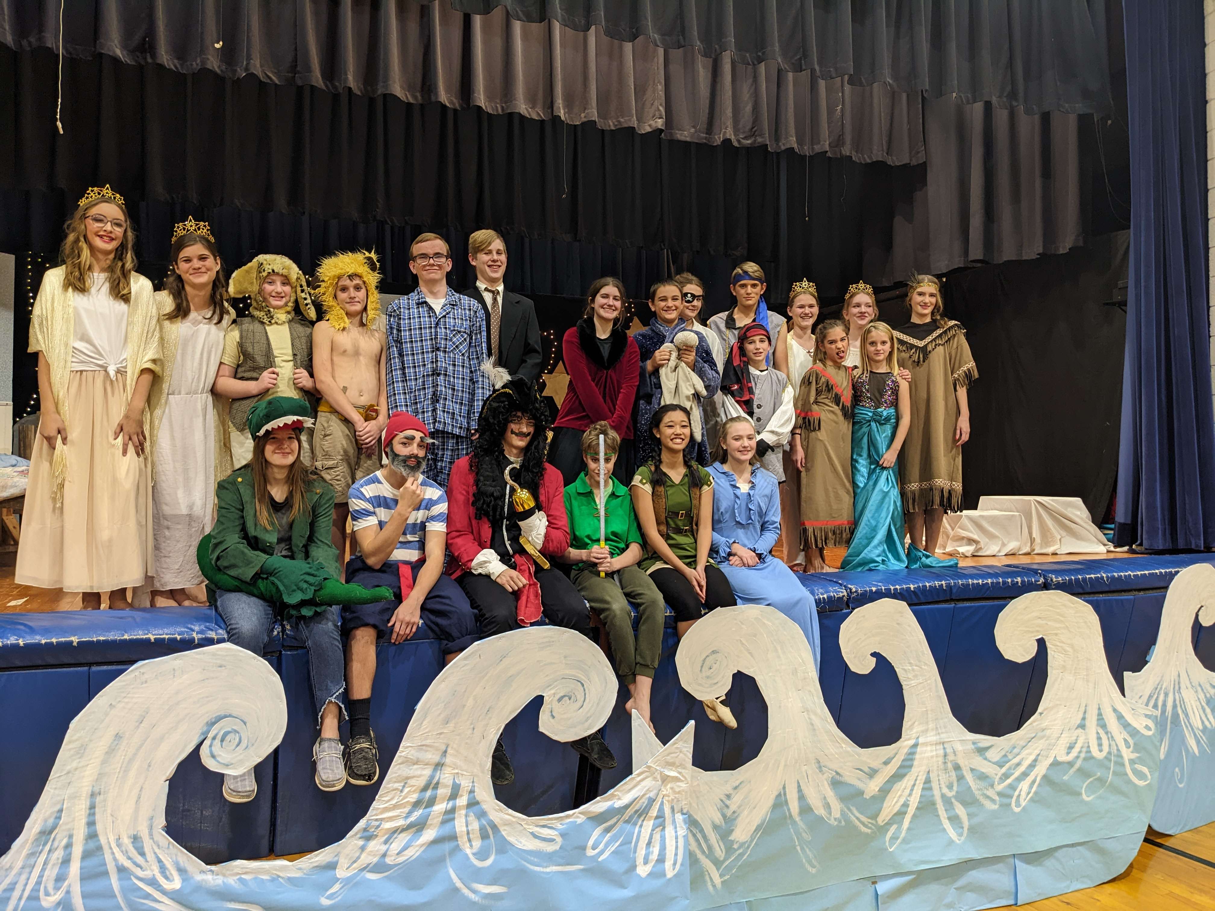 The cast of Peter Pan prepares for the play November 11 and 12.