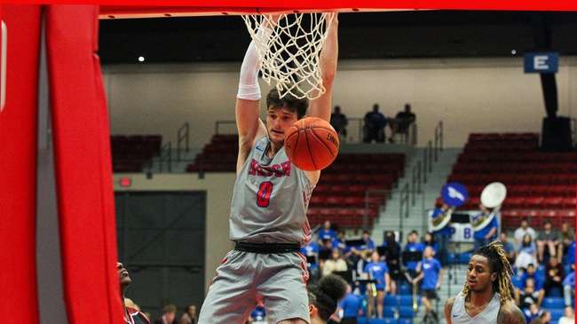 Blue Dragon freshman Kernan Bundy finishes a fastbreak dunk against Labette on Wednesday, Nov. 9, 2022 at the Hutchinson Sports Arena. (Billy Watson/Blue Dragon Sports Information)
