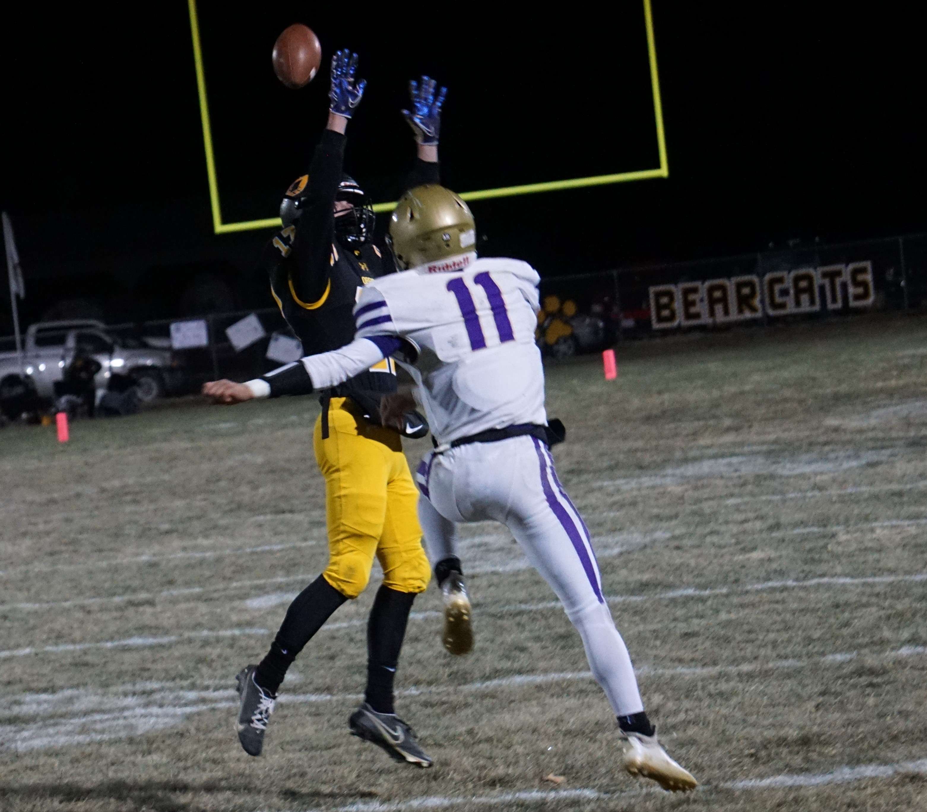 Landon Gardner (11) defends a pass.