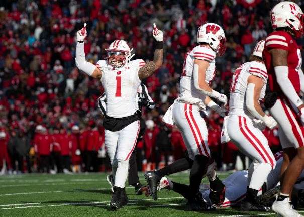 Wisconsin's Chez Mellusi (1) celebrates after teammate Graham Mertz scored a 1-yard touchdown against Nebraska to take the lead during the second half of an NCAA college football game, Saturday, Nov. 19, 2022, in Lincoln, Neb. Wisconsin defeated Nebraska 15-14. (AP Photo/Rebecca S. Gratz)
