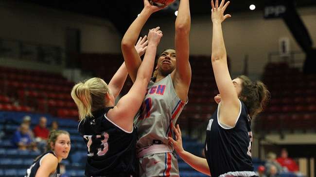 Blue Dragon freshman Monae Duffy shoots a contested shot in a double team against Independence Wednesday, Nov. 16, 2022 at the Sports Arena. (Billy Watson/Blue Dragon Sports Information)<br>