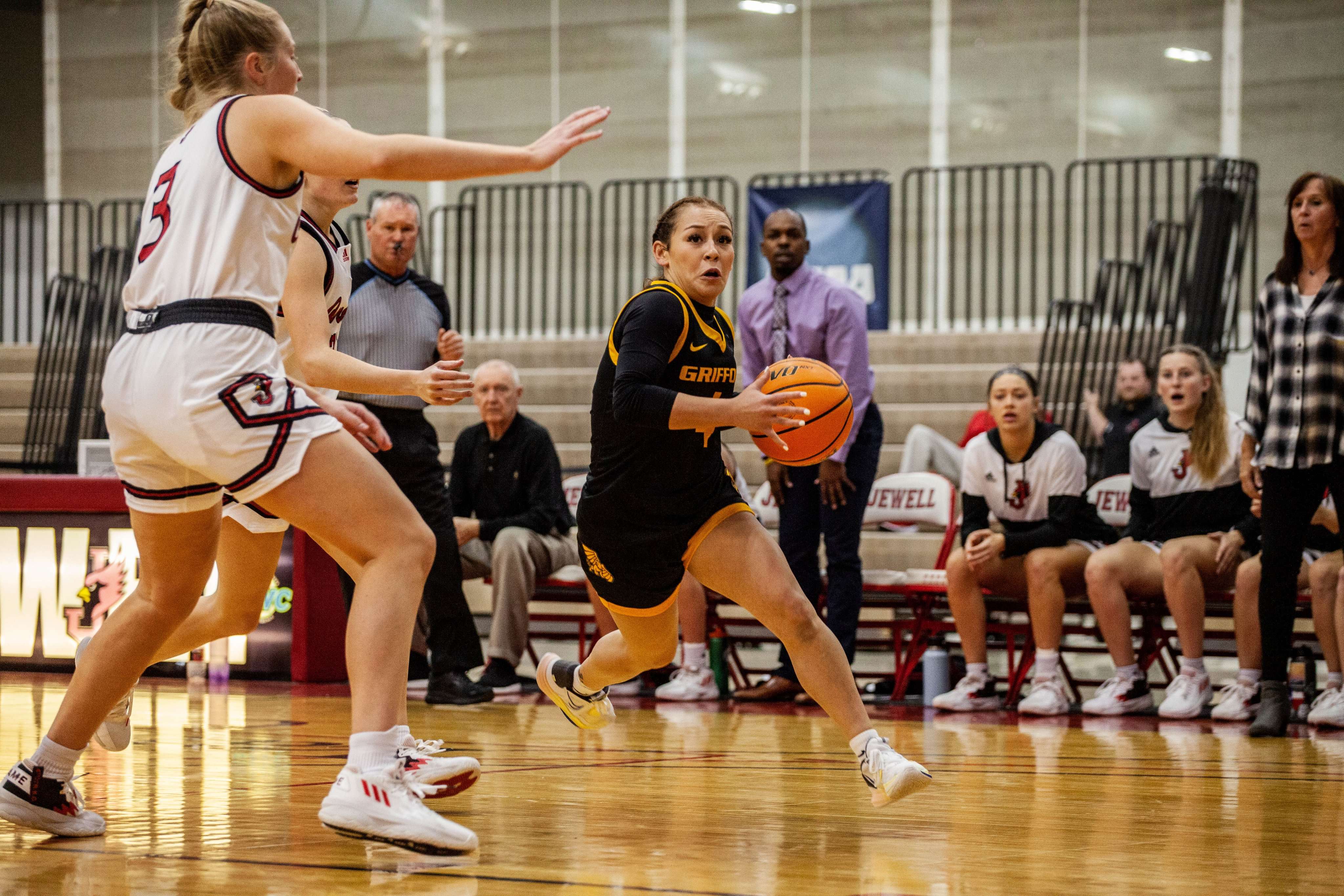 Missouri Western's Alyssa Bonilla (4) goes around a defender during the Griffons' 105-62 win at William Jewell Monday. Photo by Arianne Boma.