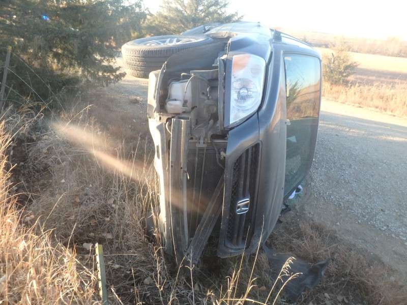 <b>The SUV ended up on its side.</b> Photos courtesy Saline County Sheriff's Office