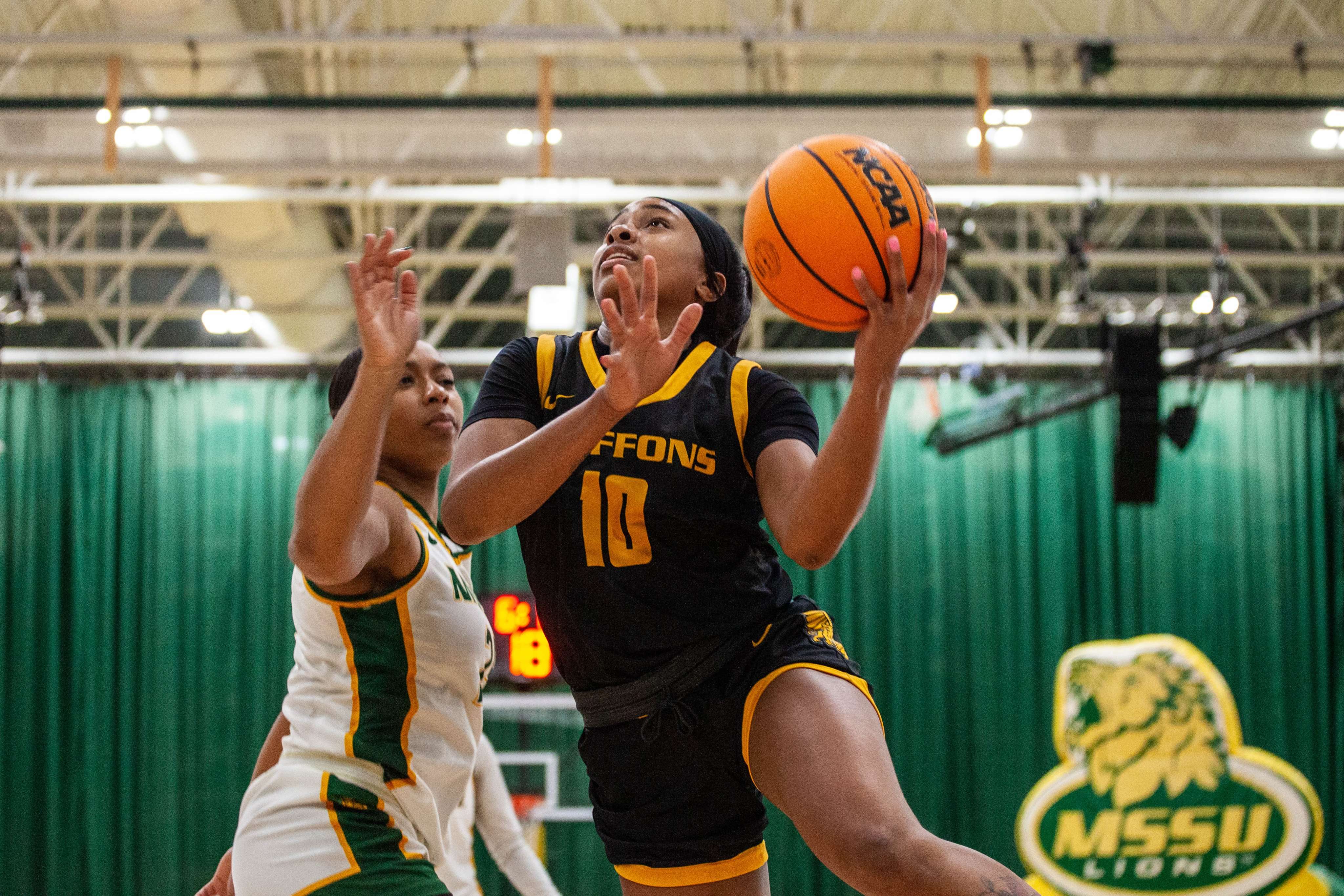 Missouri Western's Connie Clarke goes up for a basket during the Griffons' 75-69 loss at No. 5 Missouri Southern Saturday. Photo by Arianne Boma.