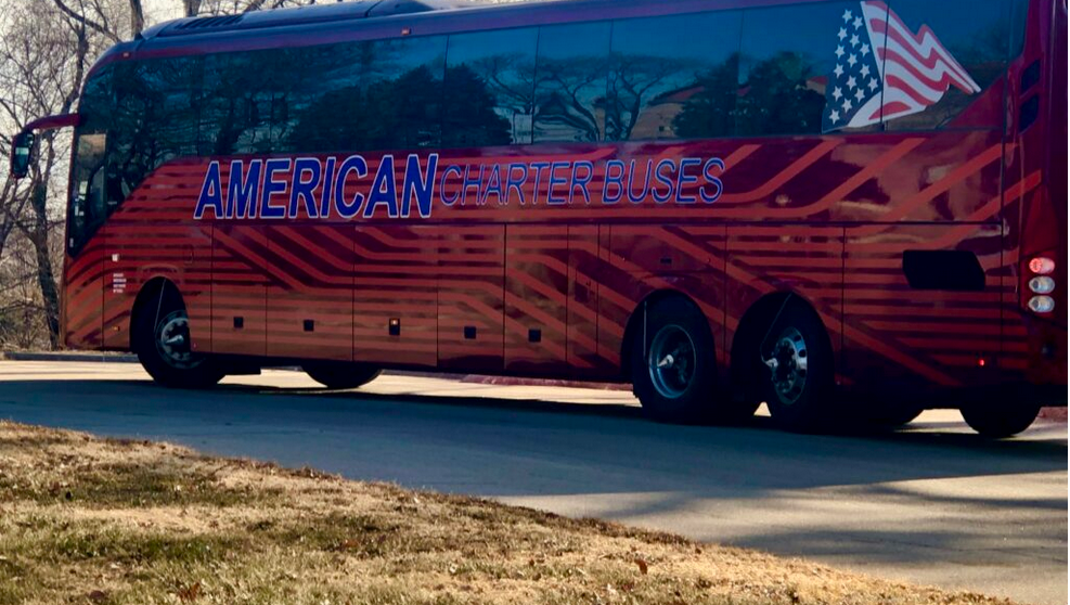 Charter bus with asylum-seeking migrants from seven different countries arrives at its Omaha destination Tuesday, Dec. 6, 2022, where a volunteer team will temporarily host them on their journey. (Cindy Gonzalez/Nebraska Examiner)