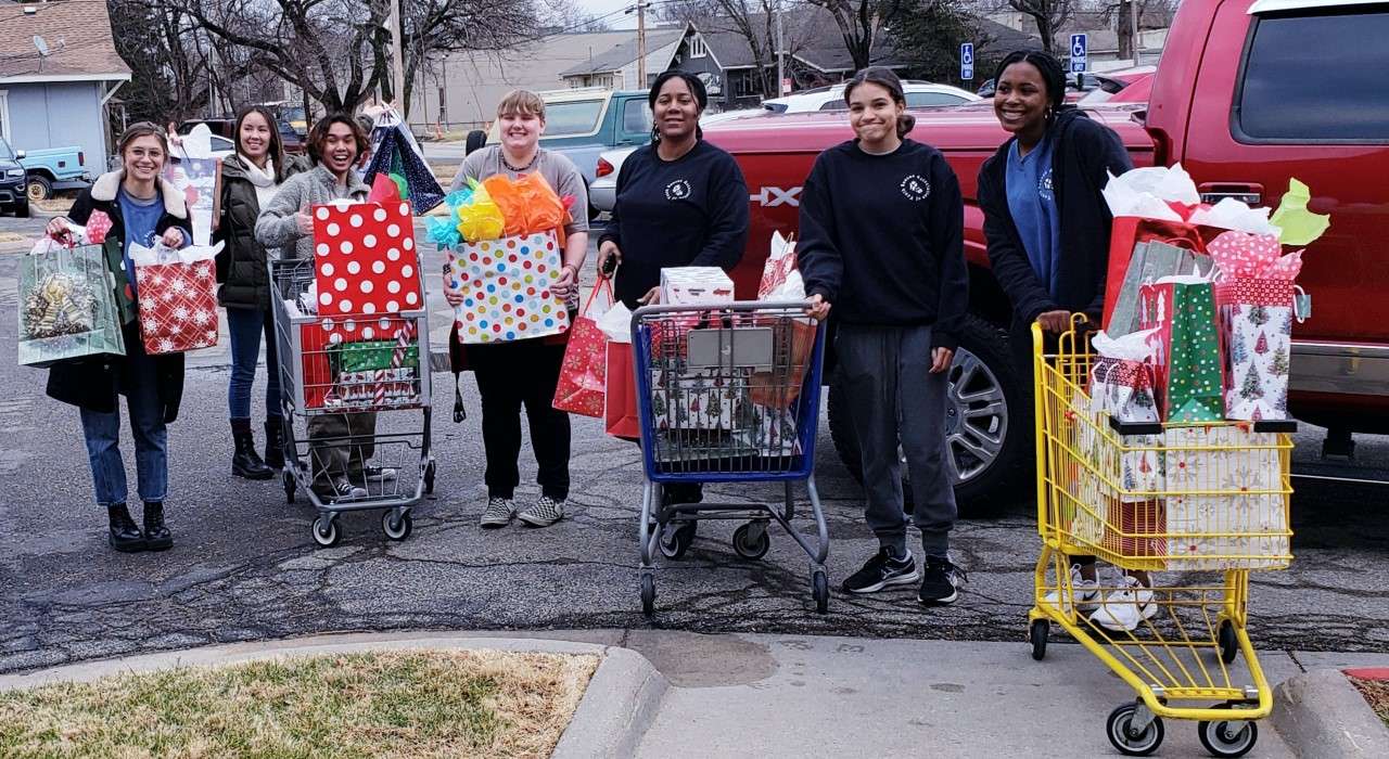 JCHS KAY Club members bring gifts to the Bicentennial Manor