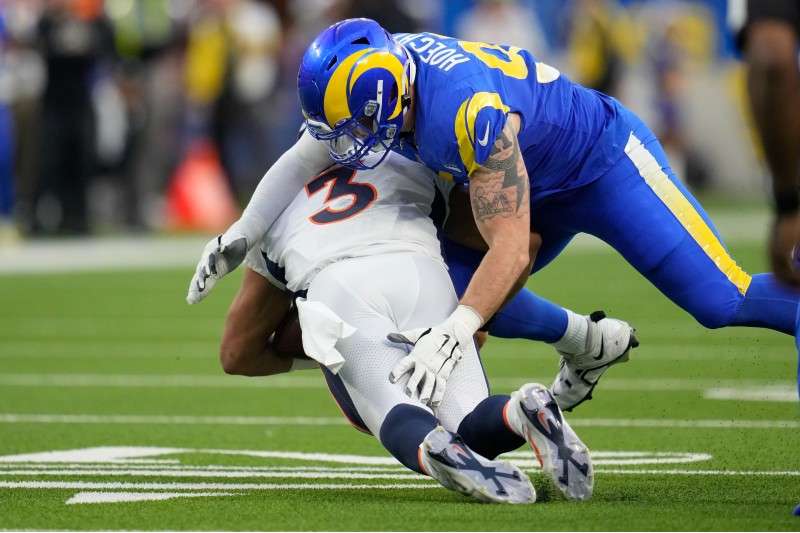 <b>Los Angeles Rams defensive tackle Michael Hoecht sacks Denver Broncos quarterback Russell Wilson during the second half of&nbsp; the game between the Los Angeles Rams and the Denver Broncos on Sunday in Inglewood, Calif. </b>(AP Photo/Marcio J. Sanchez)