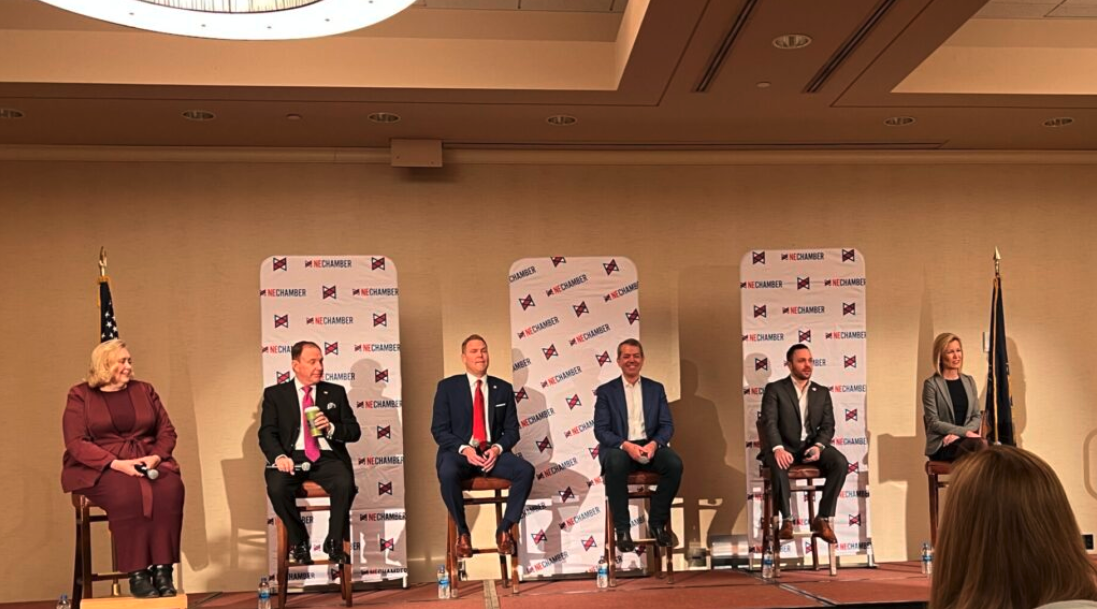 Six Nebraska’s candidates for governor participated in a forum in Lincoln hosted by the Nebraska Chambers Association. From left: State Sen. Carol Blood, Charles Herbster, State Sen. Brett Lindstrom, NU Regent Jim Pillen, Breeland Ridenour and former State Sen. Theresa Thibodeau. (Aaron Sanderford/Nebraska Examiner)