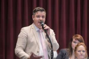 Rep. Ian Mackey, D-St. Louis, speaks on the House floor on June 30, 2021 (photo courtesy of Tim Bommel/Missouri House Communications).