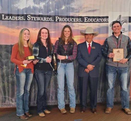 Chadron State College team members pose with the Rangeland Cup, from left, Brolin Morgan of McCook, Neb., Emma Pendleton of Hemingford, Neb., Sage McGinnis of Buena Vista, Colo., Society for Range Management President Dr. Poncho Ortega, and Hayden McGinnis of Buena Vista, Colo., Feb. 9, 2022, in Albuquerque. (Courtesy photo)