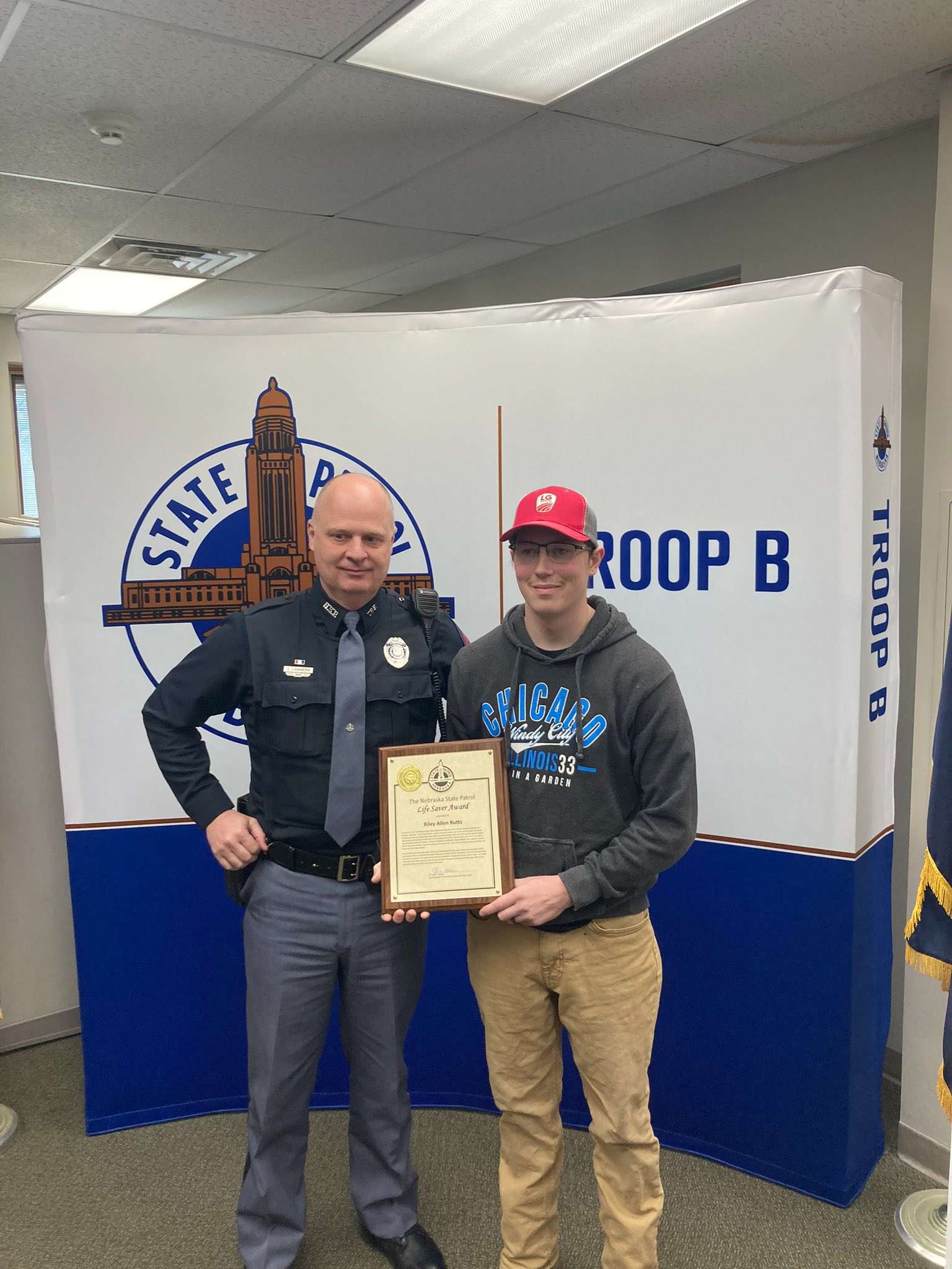 Trooper Greg Lammers with Riley Butts.&nbsp;