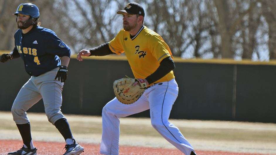 FHSU's Cade Flaherty plays defense vs. Regis Saturday afternoon at Larks Park. The Tigers split their doubleheader with the Rangers. (Courtesy FHSU Athletics, Nicole Heitmann)