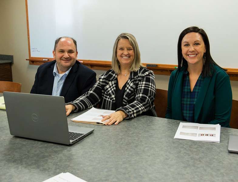 Chadron State College colleagues, from left, Dr. James Koehn, Dr. Wendy Waugh, and Dr. Shaunda French-Collins pose in Old Admin before making a virtual presentation to the national Academic Chairpersons Conference Feb. 11, 2022. (Photo by Tena L. Cook/Chadron State College)