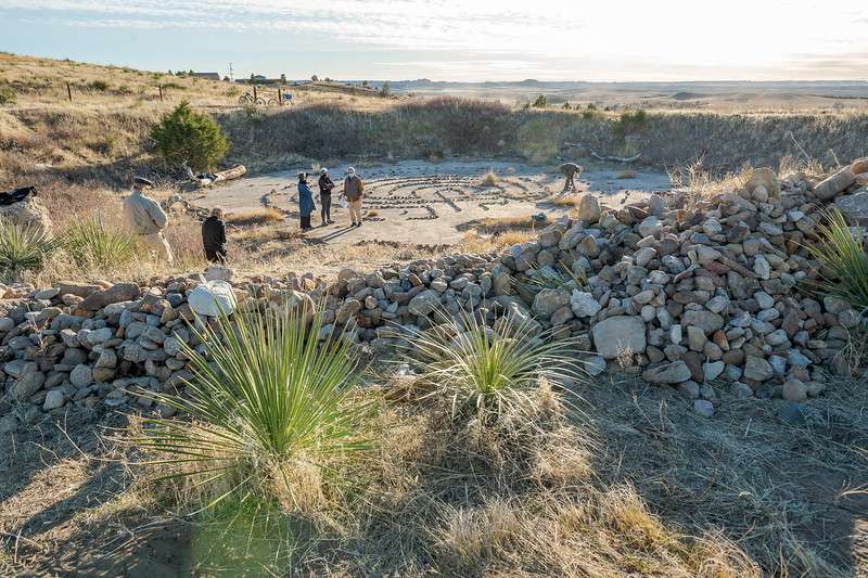 After a Rock and Run event in November 2020, rocks were piled near the site of the labyrinth and volunteers laid out the pathways.&nbsp;Photo by Daniel Binkard/CSC