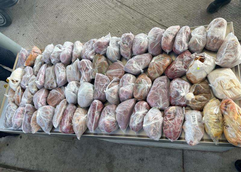  Packages containing 124 pounds of prohibited fresh pork and poultry meat seized by CBP officers, agriculture specialists at Laredo Port of Entry's Juarez-Lincoln Bridge./ Photo provided by US Customs and Border Protection