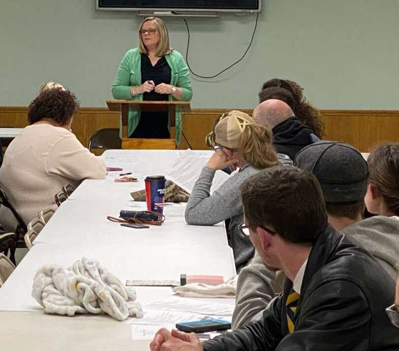 Ann Lachowitzer (at podium) and new head of schools Catherine Neumayr hosted town halls at each of the St. Joseph Catholic schools about the upcoming changes/Photo provided by Ann Lachowitzer